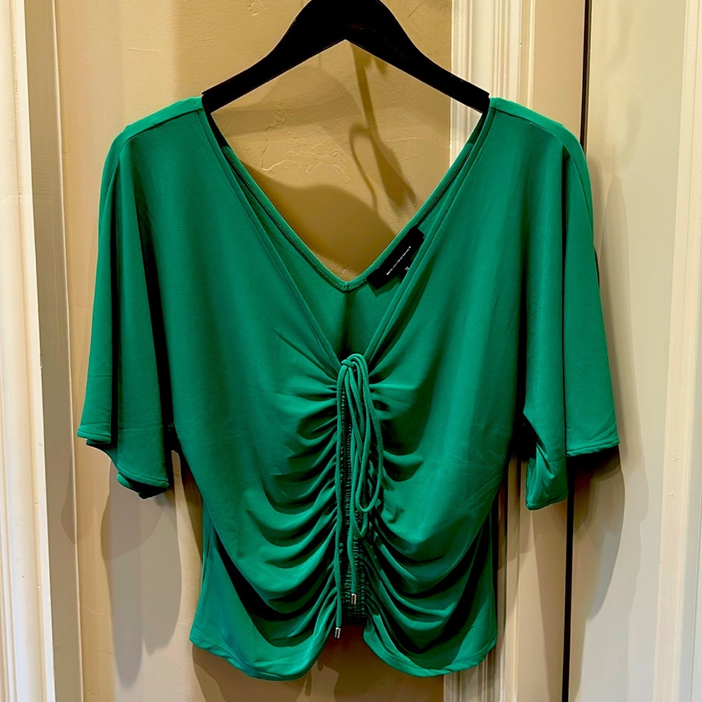 Beautiful green White House Black Market top. Size medium.